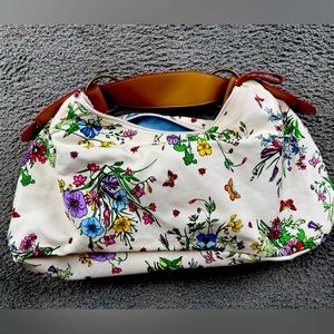 Canvas/Denim Handbag. Vivid Floral on Off-White Background. Clean Blue Interior.